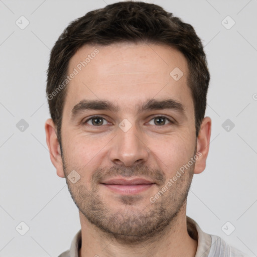 Joyful white young-adult male with short  brown hair and brown eyes