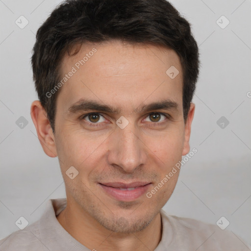 Joyful white young-adult male with short  brown hair and brown eyes