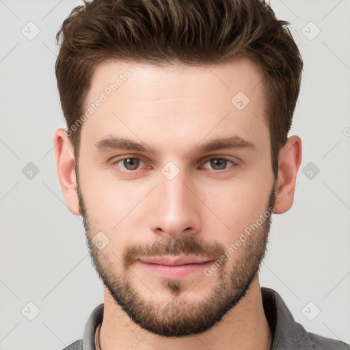 Neutral white young-adult male with short  brown hair and grey eyes