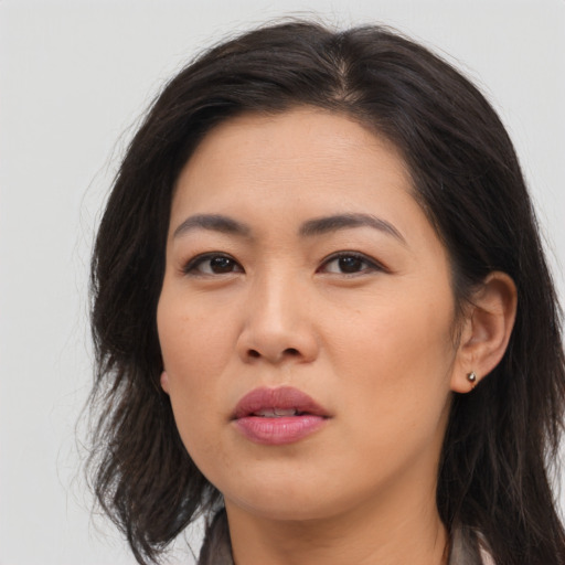 Neutral asian young-adult female with long  brown hair and brown eyes