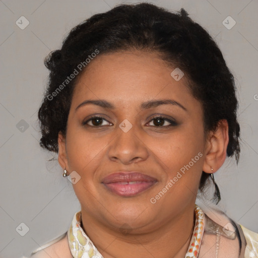 Joyful latino adult female with short  brown hair and brown eyes