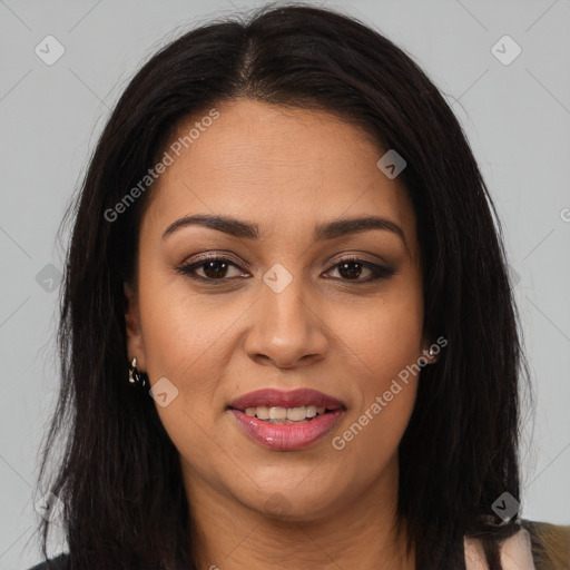 Joyful latino young-adult female with long  brown hair and brown eyes