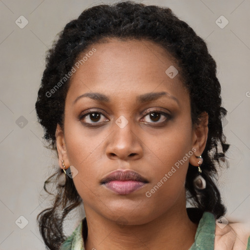 Neutral black young-adult female with long  brown hair and brown eyes