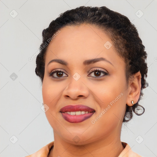 Joyful latino young-adult female with short  brown hair and brown eyes