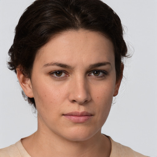 Neutral white young-adult female with medium  brown hair and brown eyes