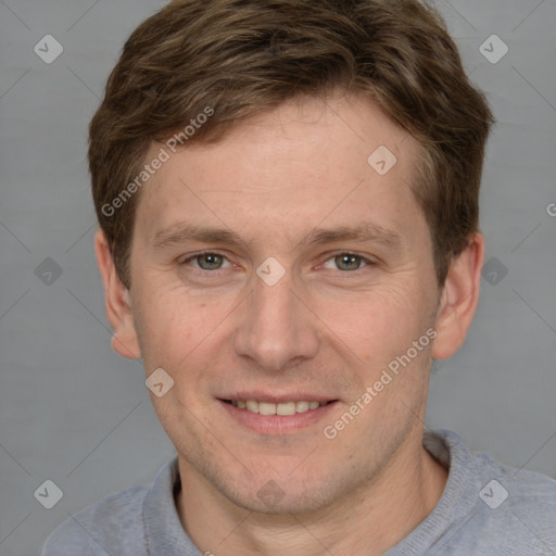 Joyful white adult male with short  brown hair and grey eyes