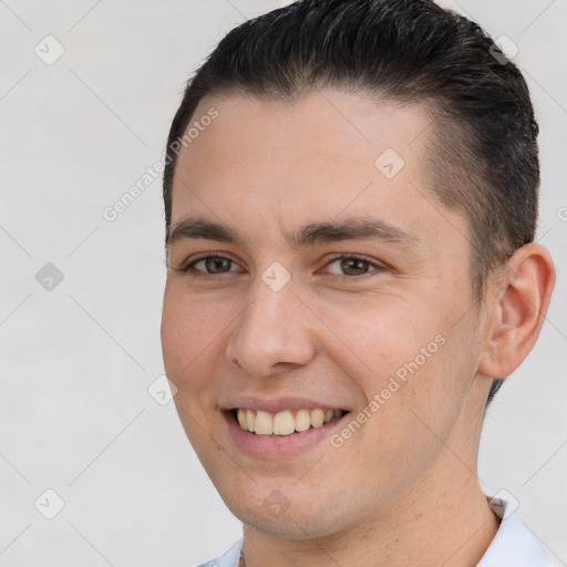 Joyful white young-adult male with short  brown hair and brown eyes