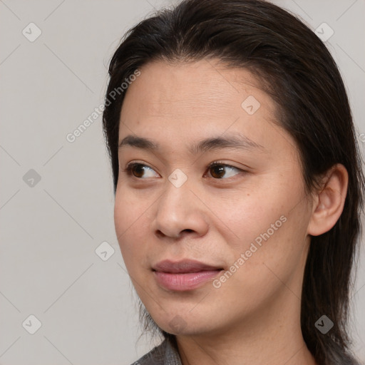 Joyful white young-adult female with medium  brown hair and brown eyes