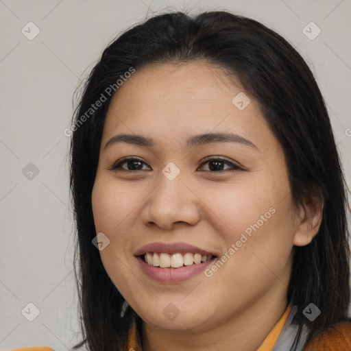 Joyful asian young-adult female with medium  brown hair and brown eyes