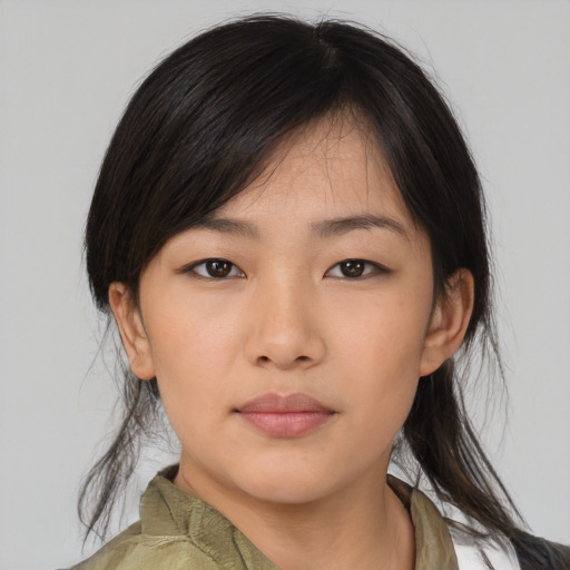 Neutral asian young-adult female with medium  brown hair and brown eyes