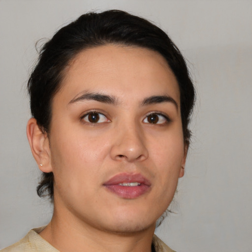 Neutral white young-adult female with short  brown hair and brown eyes