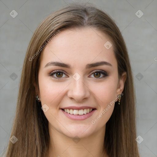 Joyful white young-adult female with long  brown hair and green eyes