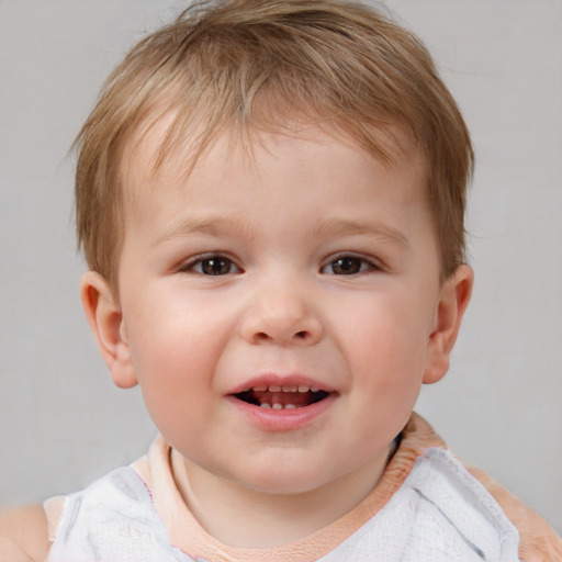 Joyful white child male with short  brown hair and brown eyes