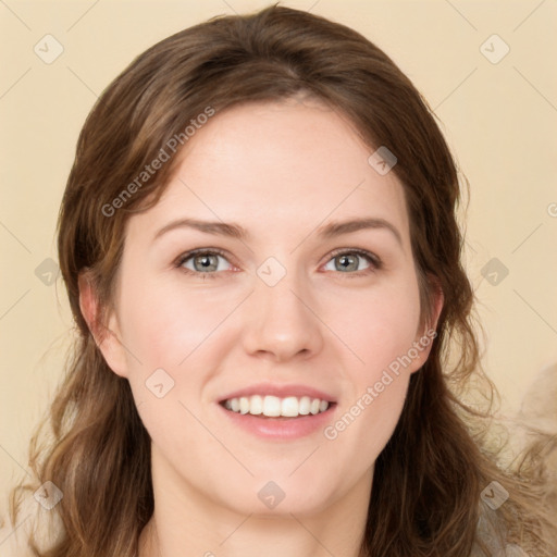 Joyful white young-adult female with medium  brown hair and green eyes