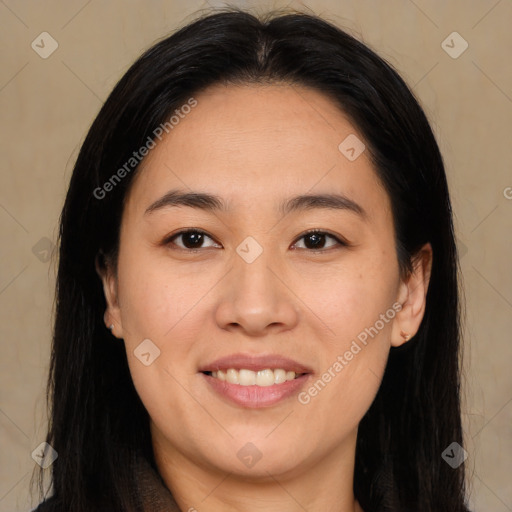 Joyful asian young-adult female with long  brown hair and brown eyes