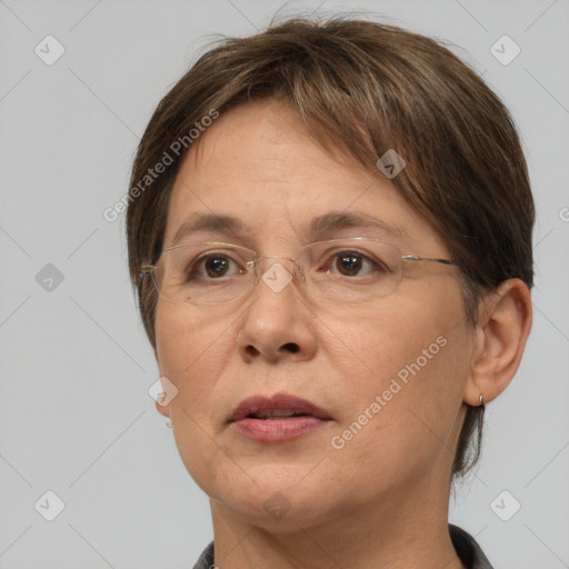 Joyful white adult female with short  brown hair and brown eyes