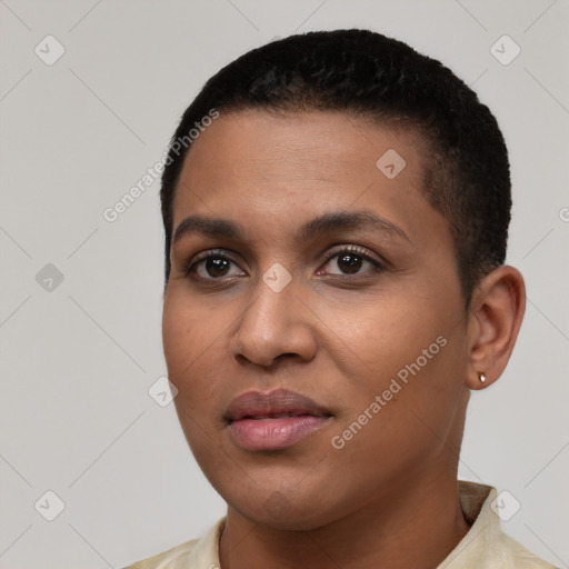 Joyful latino young-adult female with short  brown hair and brown eyes