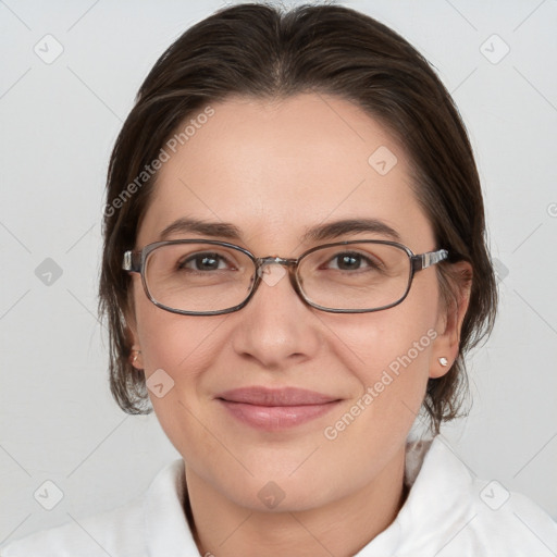 Joyful white adult female with medium  brown hair and grey eyes