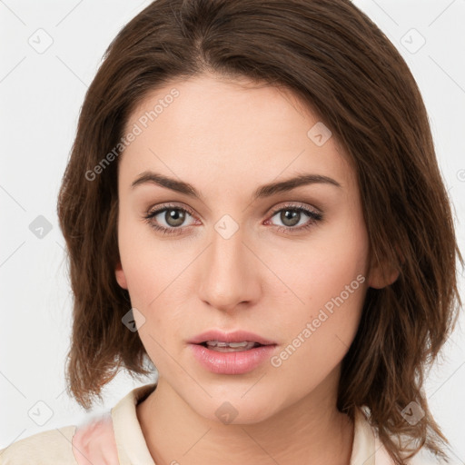 Neutral white young-adult female with medium  brown hair and brown eyes