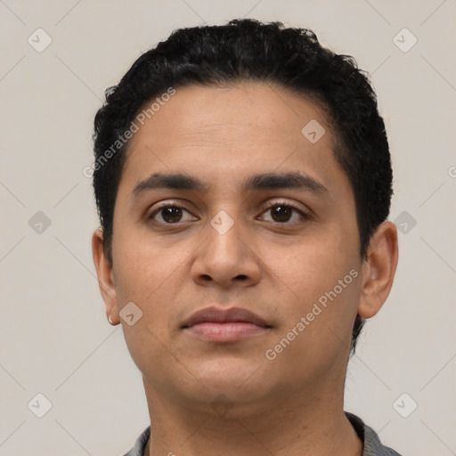 Neutral latino young-adult male with short  black hair and brown eyes