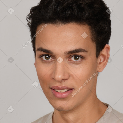 Joyful white young-adult male with short  black hair and brown eyes