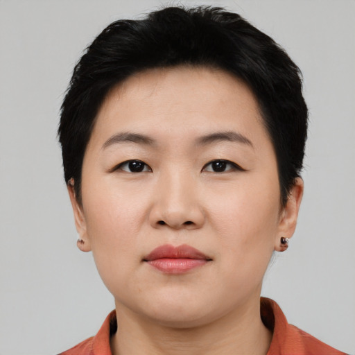 Neutral white young-adult female with short  black hair and brown eyes