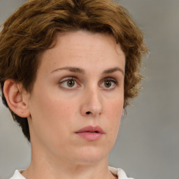 Neutral white young-adult female with short  brown hair and brown eyes