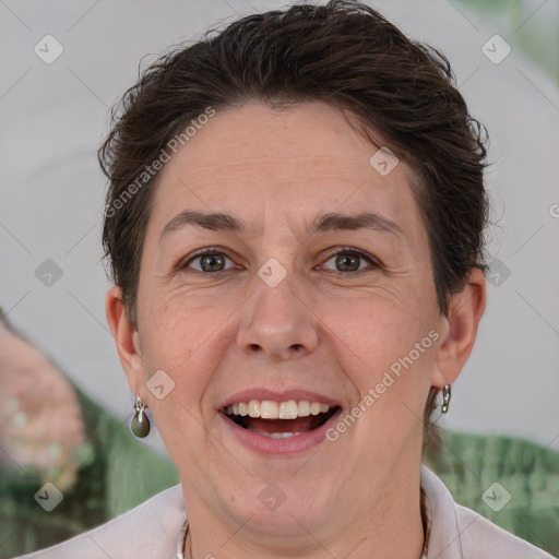 Joyful white adult female with short  brown hair and brown eyes