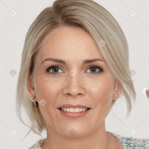 Joyful white adult female with medium  brown hair and blue eyes