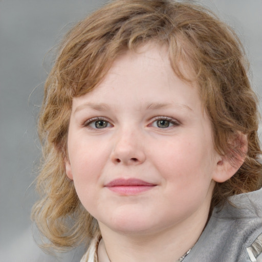 Joyful white child female with medium  brown hair and grey eyes