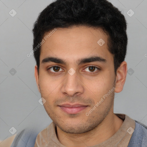 Neutral white young-adult male with short  black hair and brown eyes