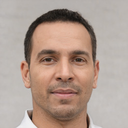 Neutral white adult male with short  brown hair and brown eyes