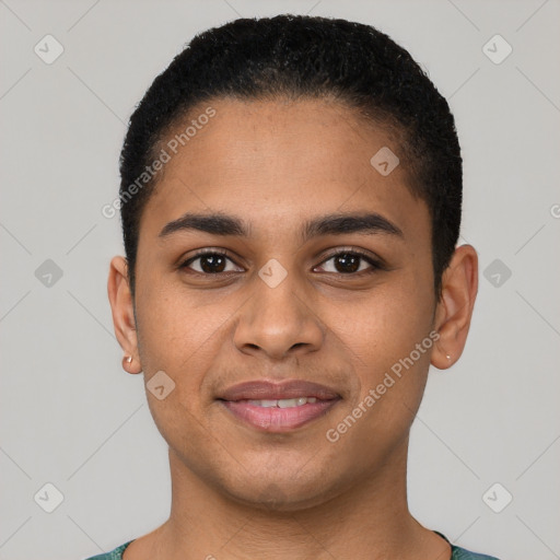 Joyful latino young-adult male with short  brown hair and brown eyes