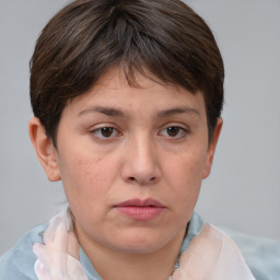 Neutral white young-adult female with short  brown hair and brown eyes