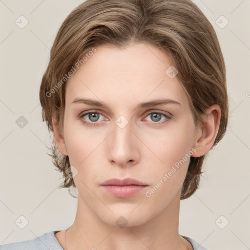 Neutral white young-adult female with medium  brown hair and grey eyes