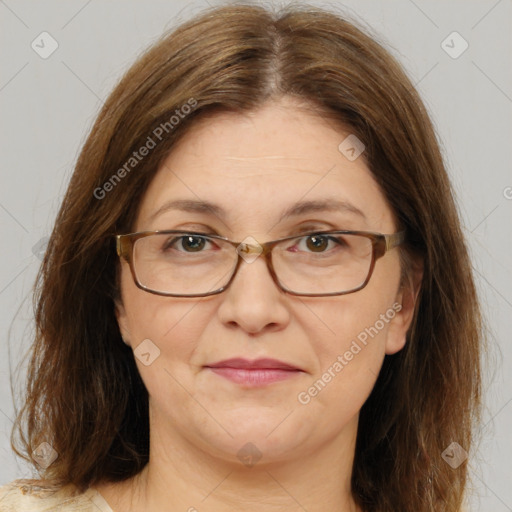 Joyful white adult female with medium  brown hair and brown eyes