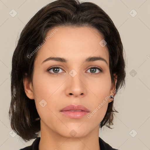 Neutral white young-adult female with medium  brown hair and brown eyes