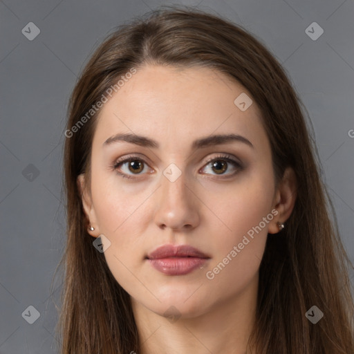 Neutral white young-adult female with long  brown hair and brown eyes