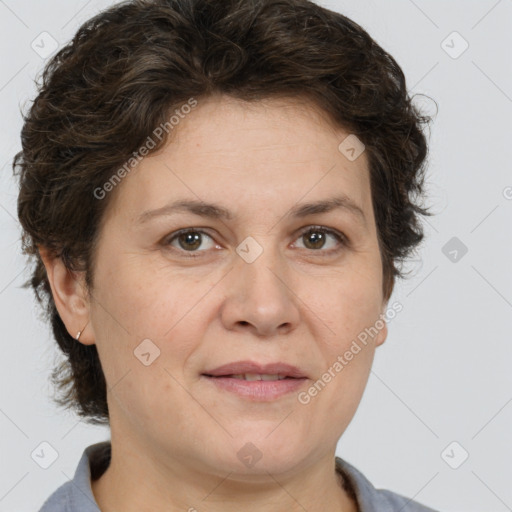 Joyful white adult female with short  brown hair and brown eyes