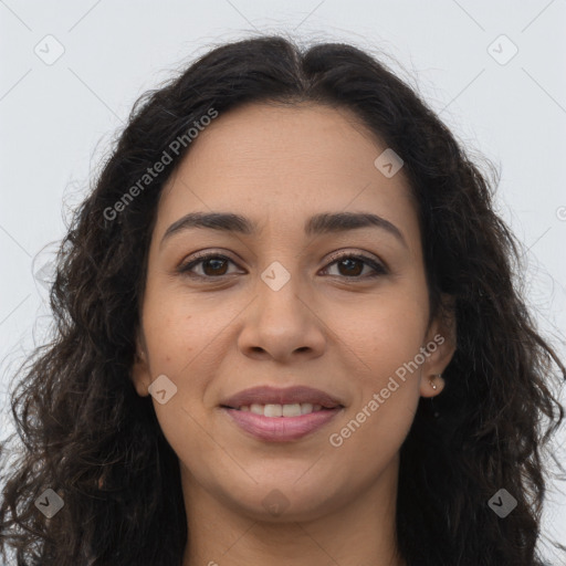 Joyful latino young-adult female with long  brown hair and brown eyes