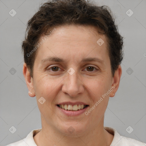 Joyful white adult female with short  brown hair and brown eyes