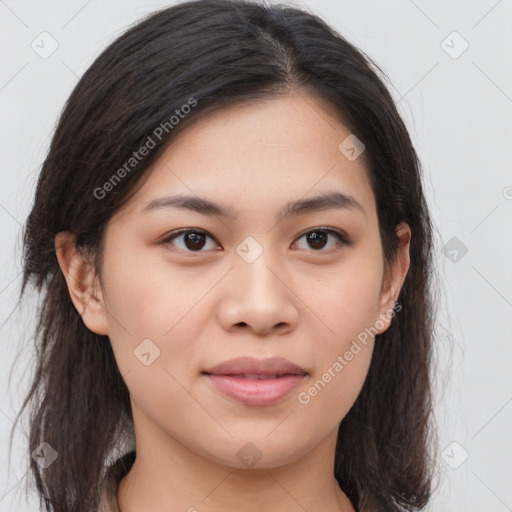 Joyful asian young-adult female with long  brown hair and brown eyes