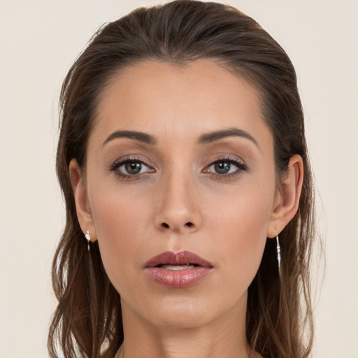 Joyful white young-adult female with long  brown hair and grey eyes