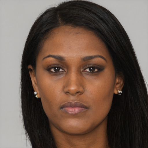 Neutral black young-adult female with long  black hair and brown eyes