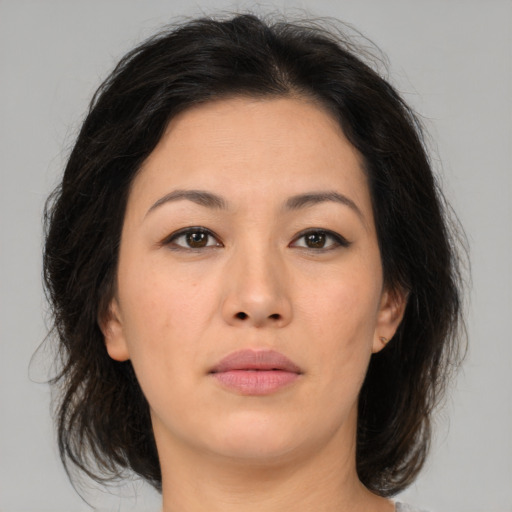 Neutral asian young-adult female with medium  brown hair and brown eyes