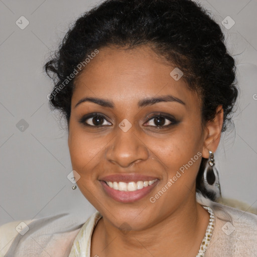 Joyful black young-adult female with short  brown hair and brown eyes