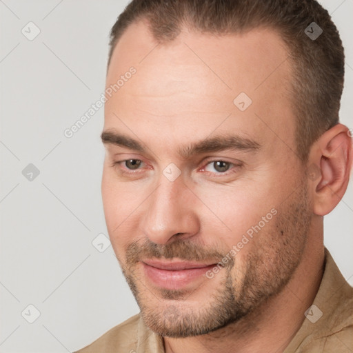 Joyful white adult male with short  brown hair and brown eyes