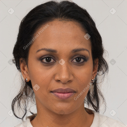 Joyful black young-adult female with medium  brown hair and brown eyes