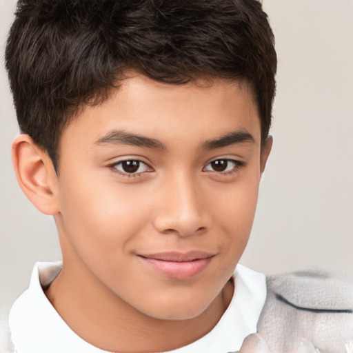 Joyful white child male with short  brown hair and brown eyes