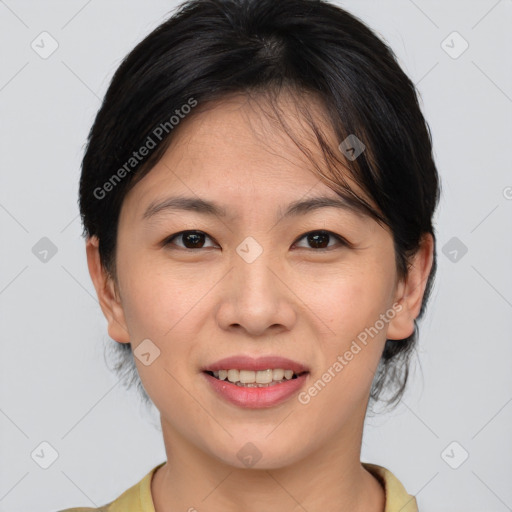 Joyful asian young-adult female with medium  brown hair and brown eyes